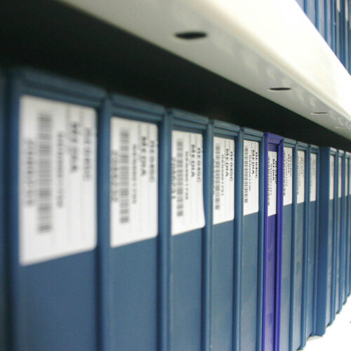 Organized file folders for information and file management system.