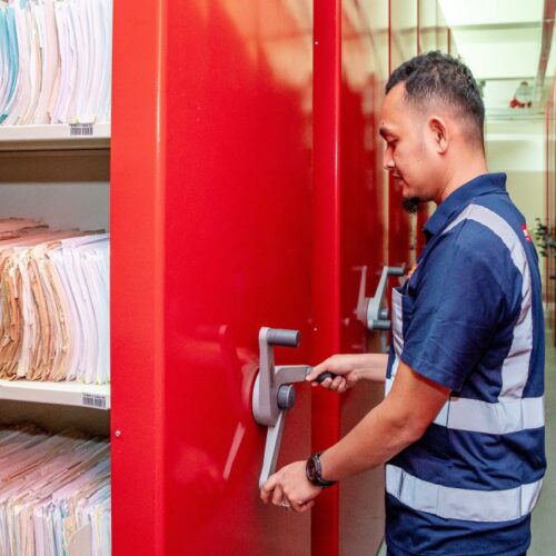 Staff accessing securely archived documents.