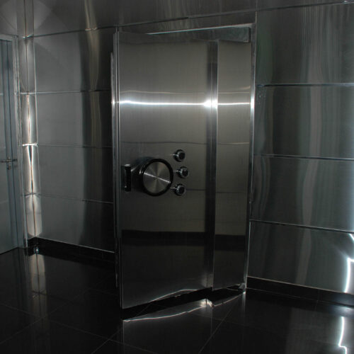 A large stainless steel vault door.